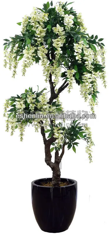 
Искусственное дерево из цветов глицинии, в горшке с зелеными листьями 