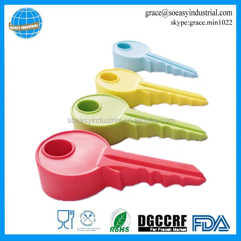 Novelty wedge key shape silicone door stops