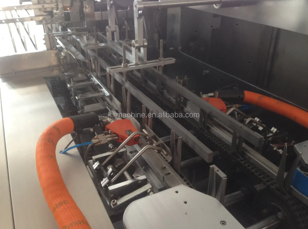 Автоматическая машина для упаковки бумажных коробок на лице