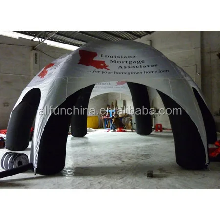 
inflatable doom tent with white top and black leg. spider doom tent 