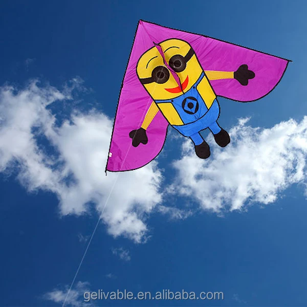 Chinese child flying kite with long tail