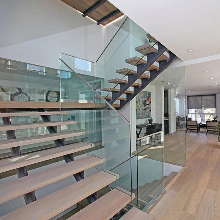 Hard wood steps and tempered glass railing Interior Steel wood staircase