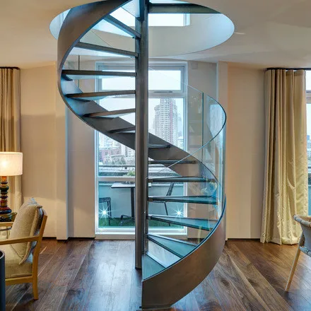 
Steel glass spiral staircase stairs with modern railing 