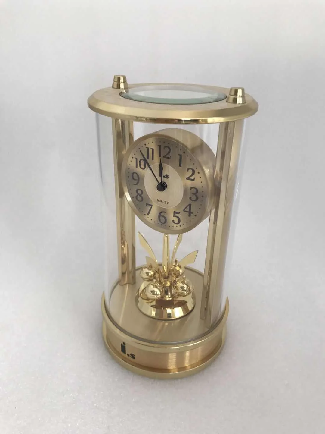 Aluminum table clock with rotating pendulum
