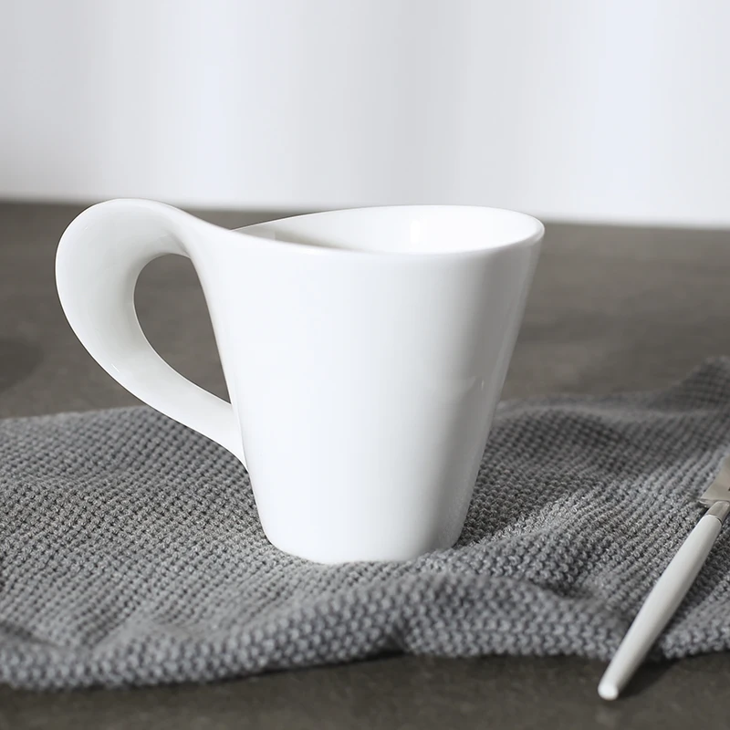 Novelty creative shape fine quality porcelain ivory 8oz fine bone china mug with wavy handle