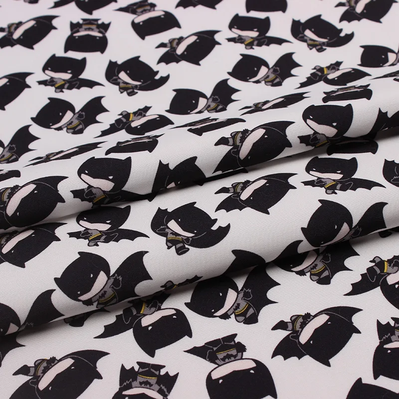 In stock twill peach skin fabric with cartoon batman print for children jacket