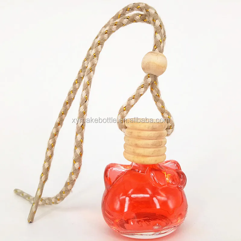 hello kitty hanging car perfume bottle with wood cap