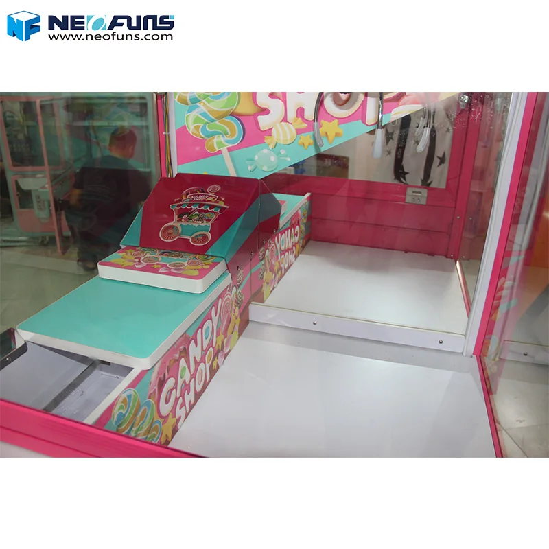 Neofuns Colorful Candy Shop Theme Claw Machine Pink Candy Vending Crane Machine for Sale