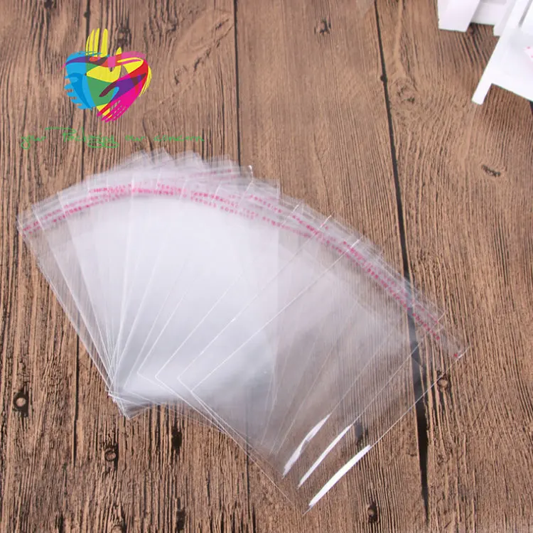 
Clear plastic self adhesive DVD packaging CD sleeves packing 