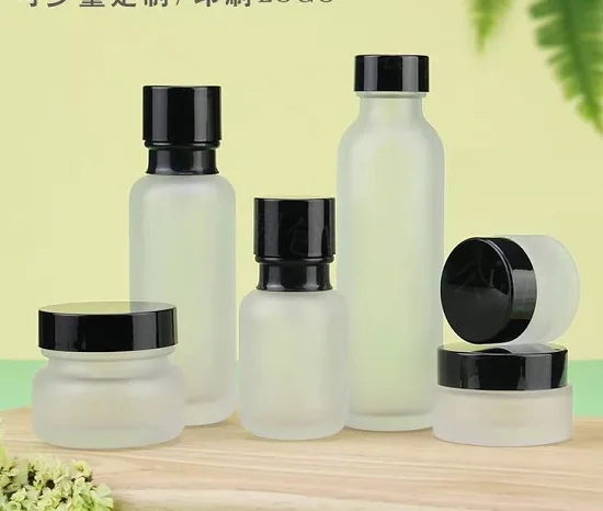 
new design cosmetic packing sets unique red lotion glass bottle and cream jar 