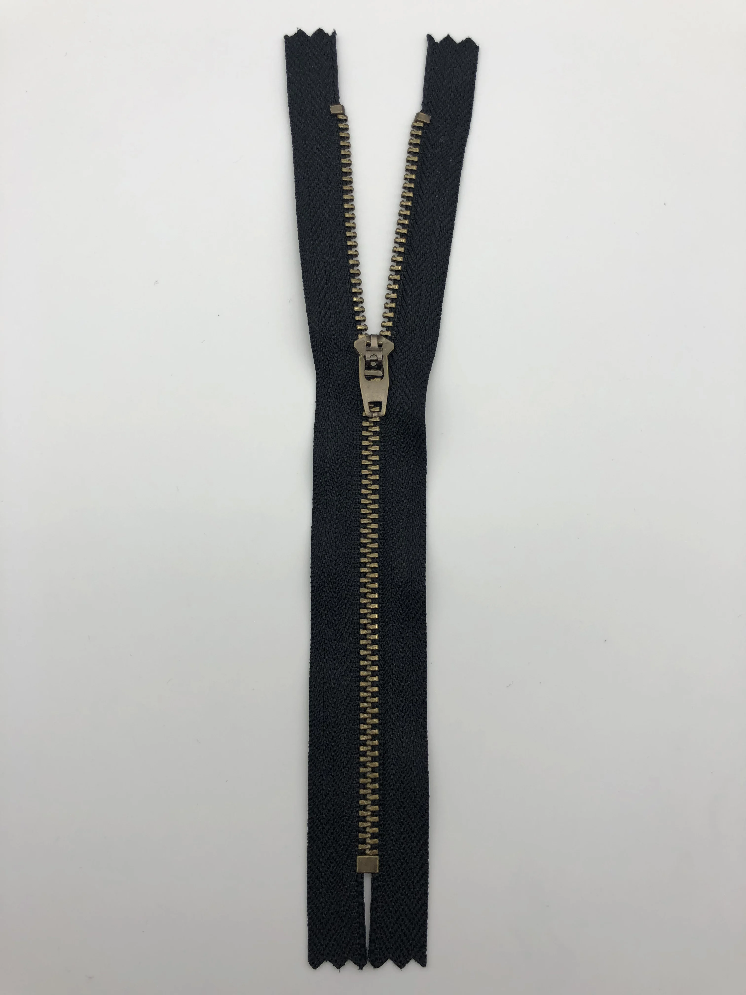 cheap brass metal yg zipper 15cm for jean pant