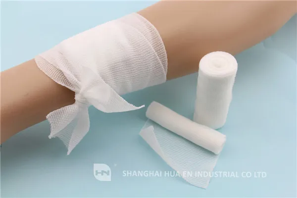 Conforming elastic cohesive stretch PBT bandage roll