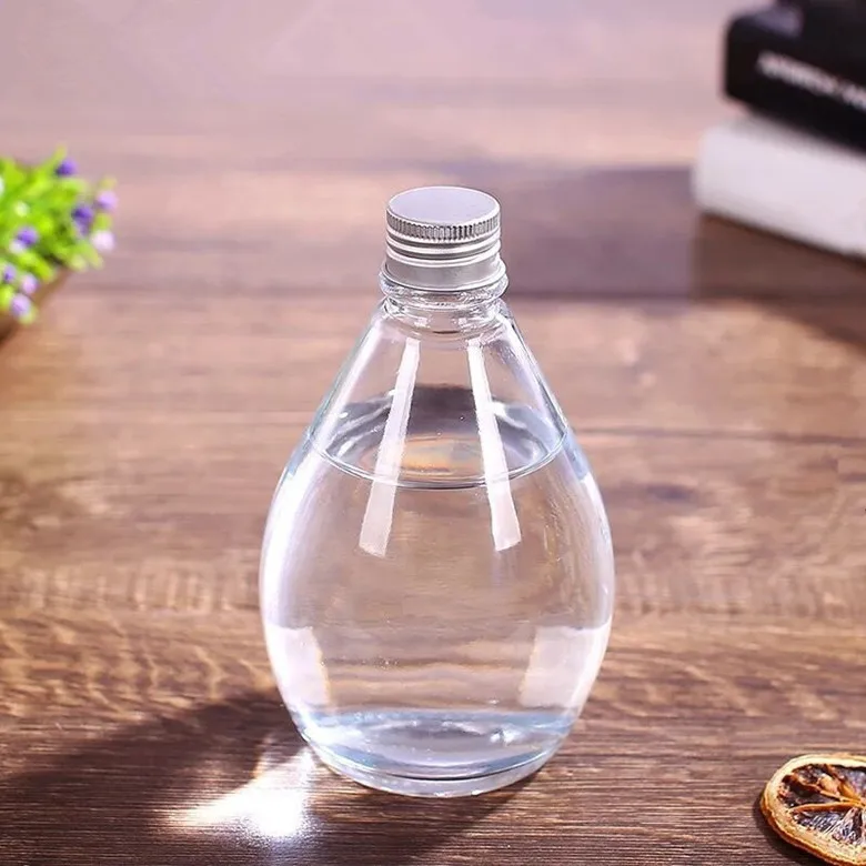 High quality 350ml water drop shape glass bottle for fruit wine/milk tea/coffee/juice with screw cap