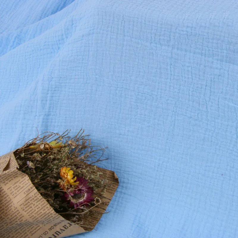 Large stock garment fabric using 100% cotton dyed double layers gauze crepe fabric