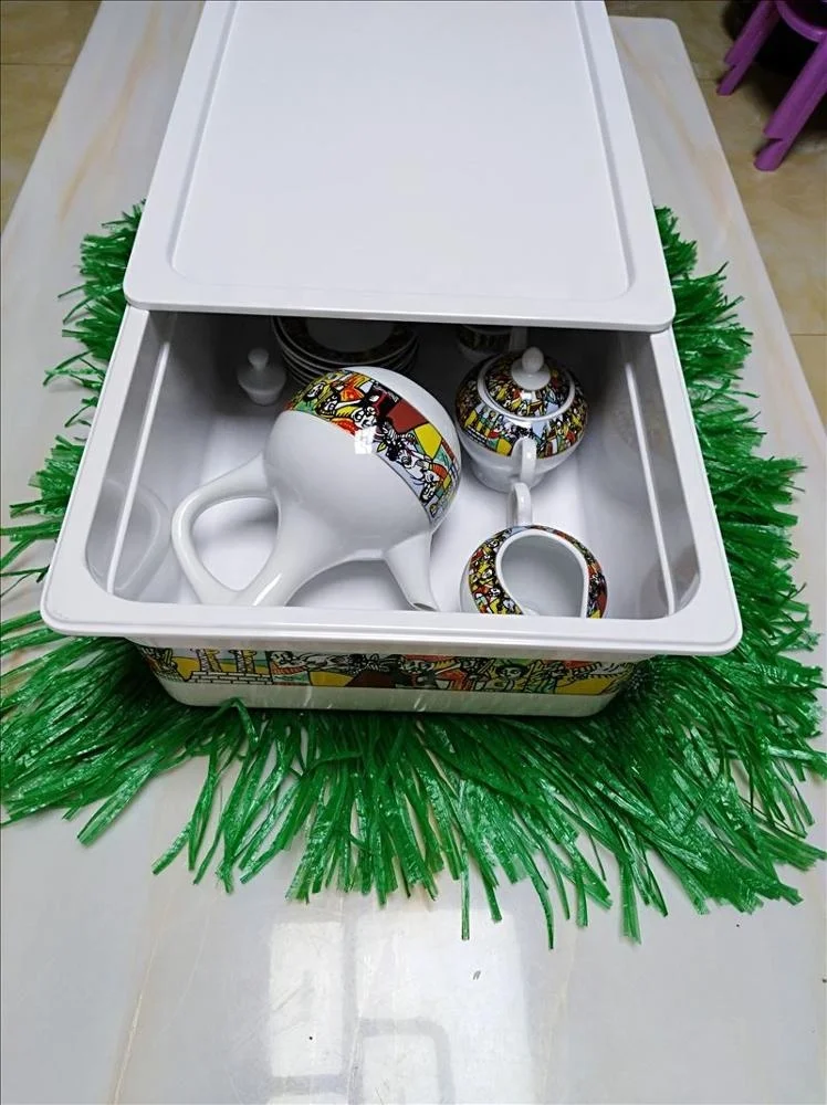 Coffee tray of rekebot for Ethiopian Eritrean Coffee ceremony with saba and tilet designs