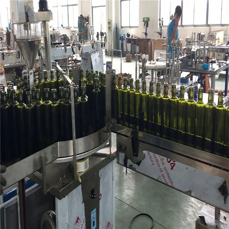 Lemon Oil Filling Capping Machine With Labeling  Coconut oil filling machine With Four head