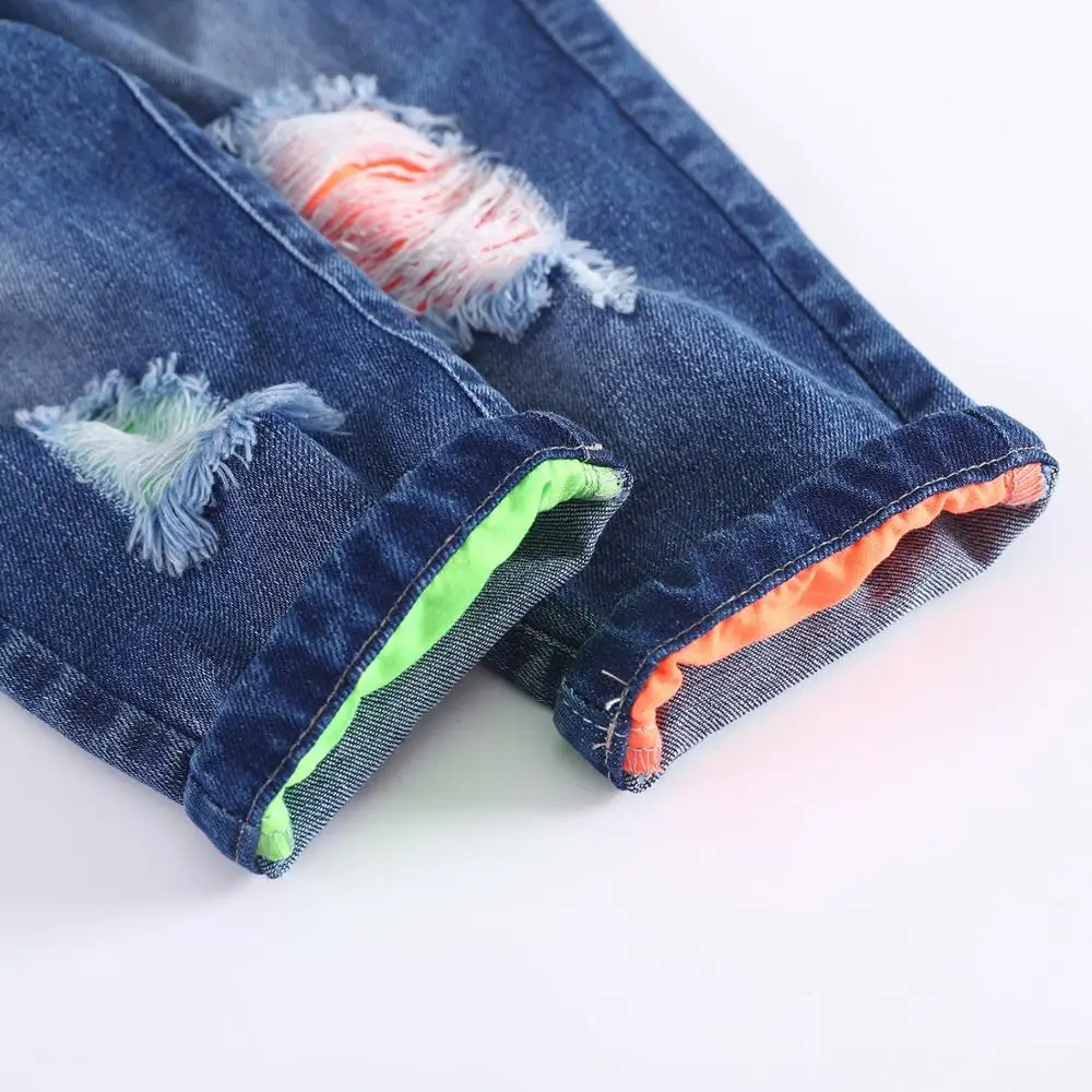 
2021 Newest Design Cool Kids Jeans Fashion Ripped Patchwork Causal Pants Color Fade Proof Breathable Feature Baby Boys Trousers 