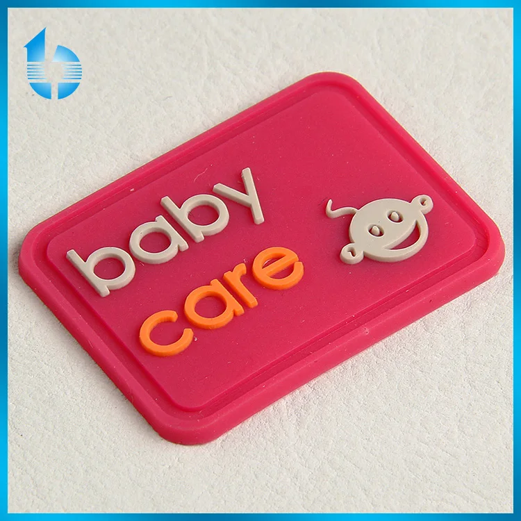 Soft washable Clothing PVC customized rubber label, silicon 3D label for baby care products
