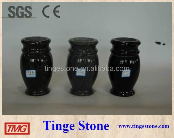 Carved stone lantern and vase for cemetery use