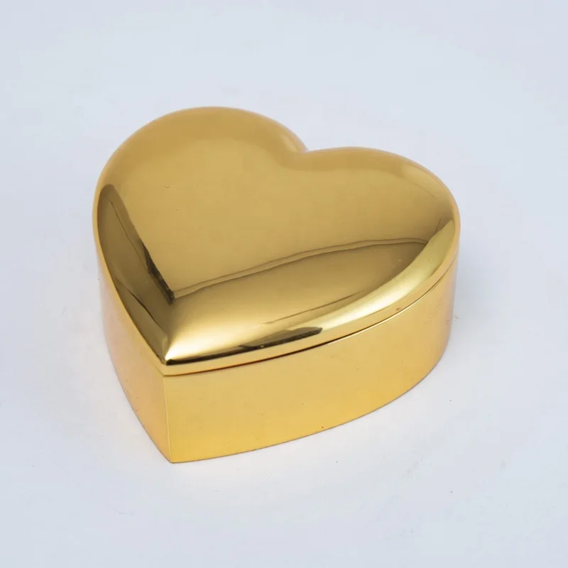 Heart-shaped metal jewelry box in gold plated