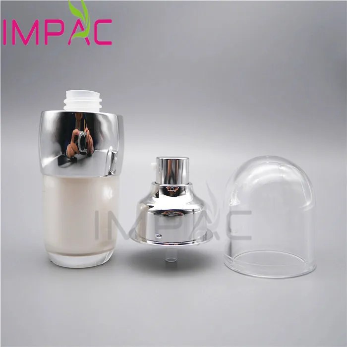 Luxury airless serum pump bottle with silver vacuum pump for cosmetics