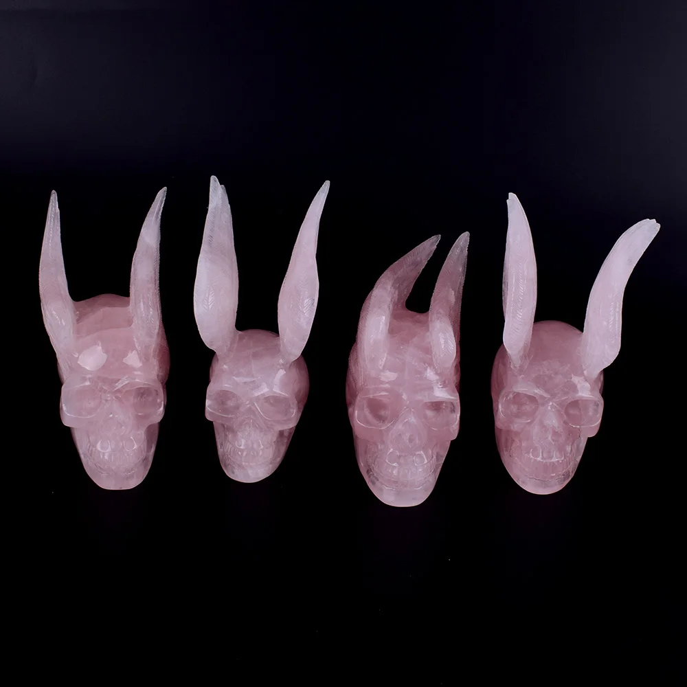 Natural rose quartz crystal hand carved Alien and Wing skull Sculpture for sale