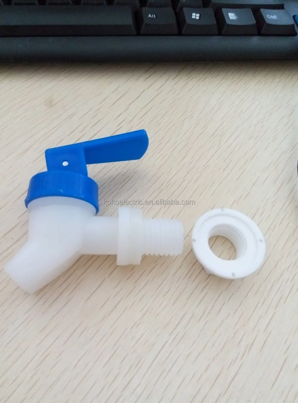 Plastic bottled water dispenser tap with red or blue handle