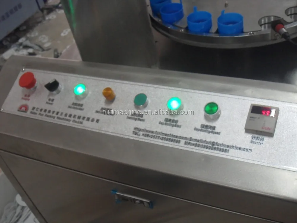 Non spill Cap foam Liner inserting machine