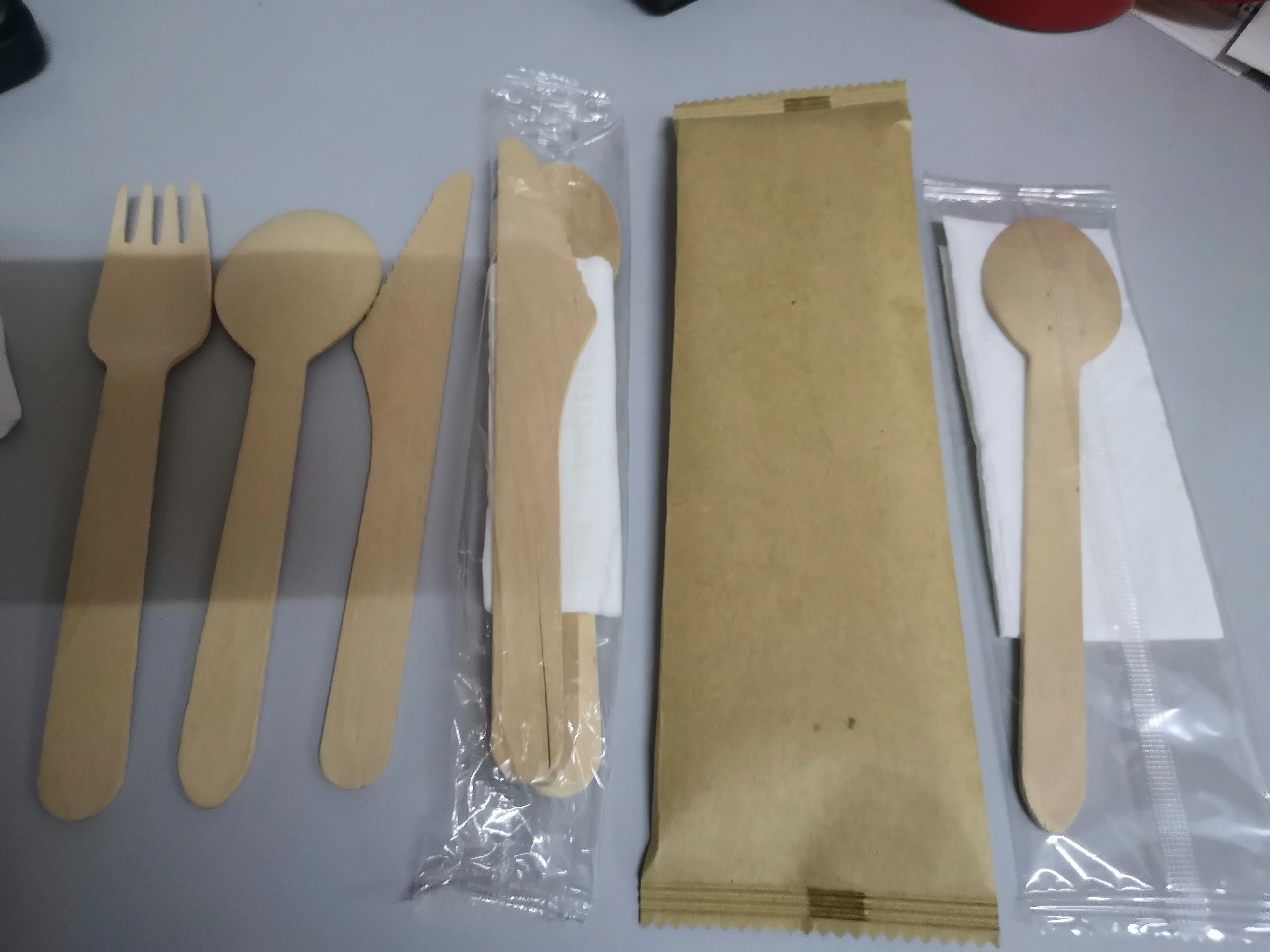 Eco-friendly wooden cutlery PLA tableware takeaway spoon fork knife napkin salt pepper set automatic packing machine