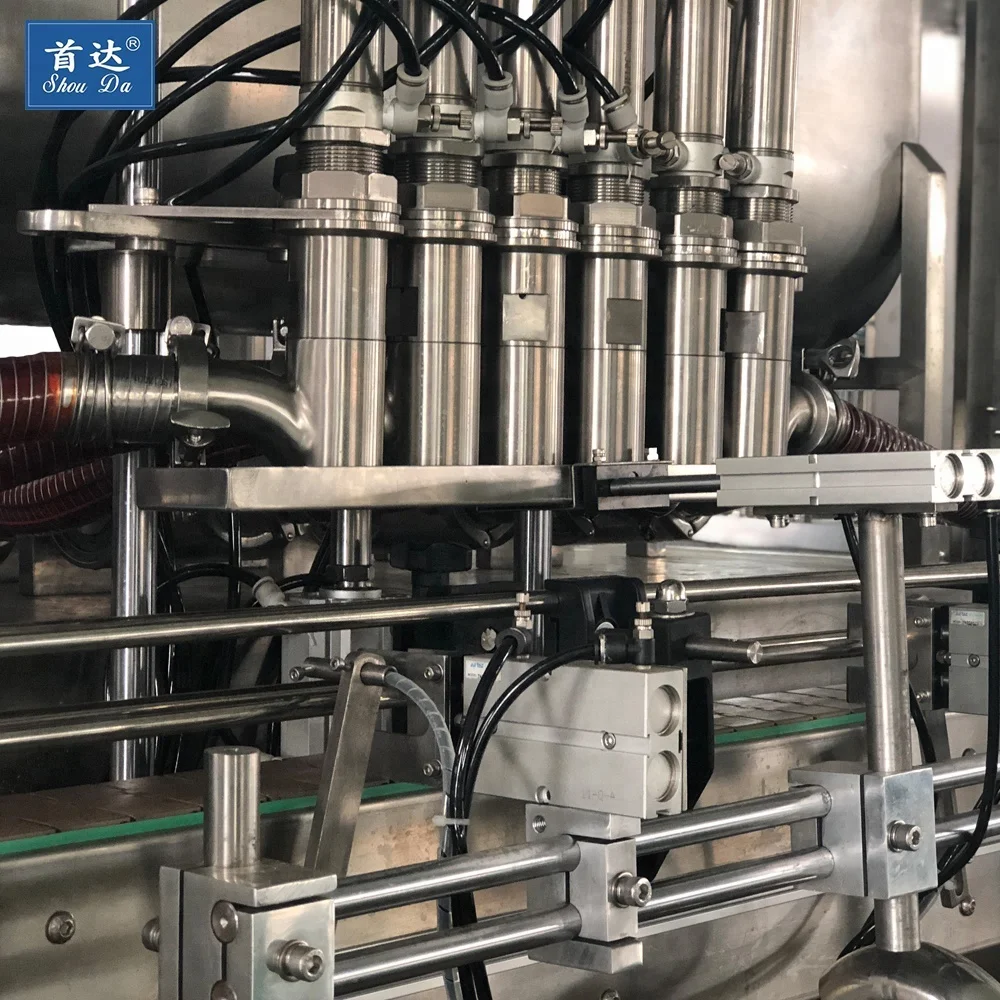 
Professional factory automatic oil plum with pulp bottle filling capping and labeling line with CE certificate 