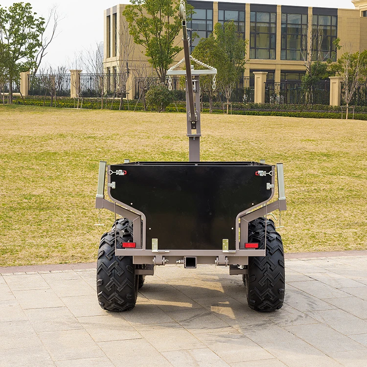 Black dump steel with electric brakes and loading ramps box trailer