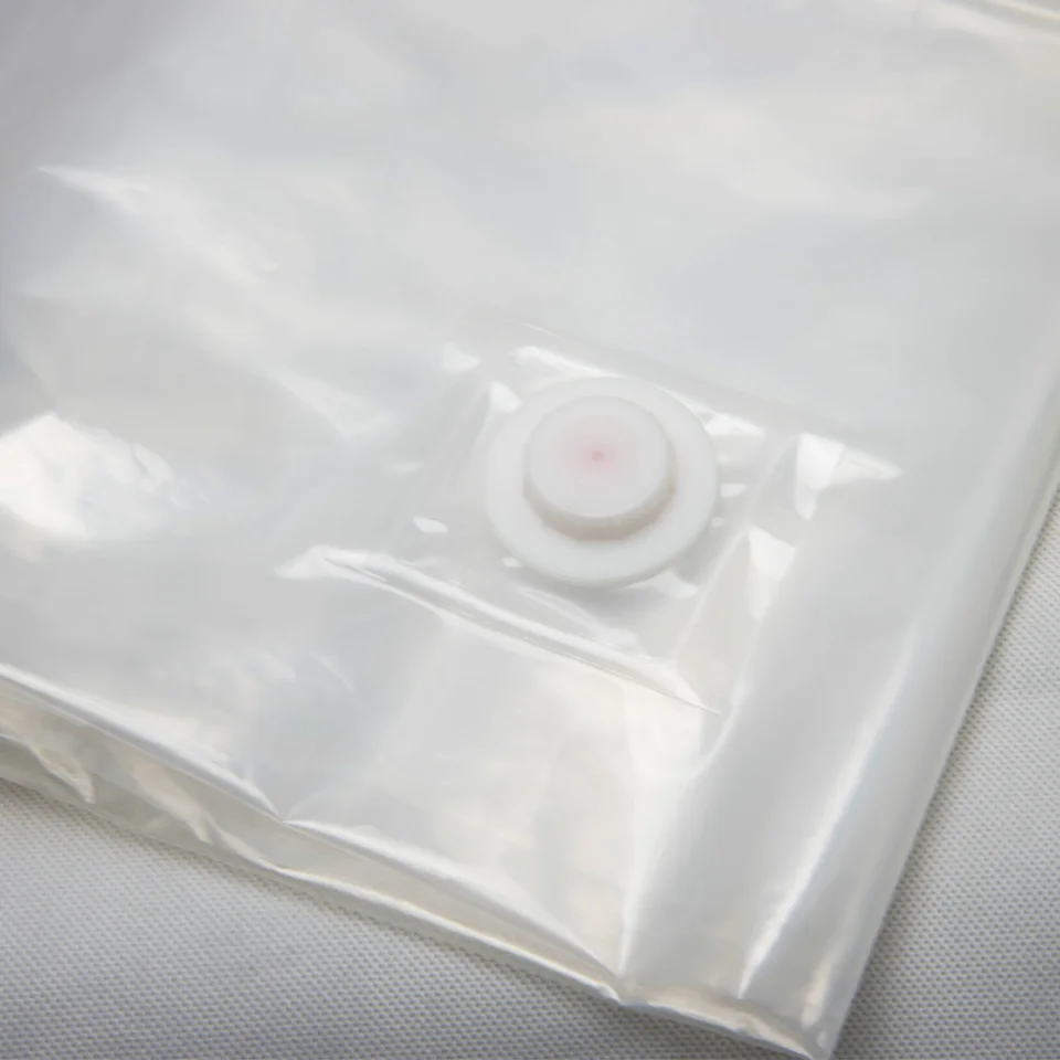 Space-saving vacuum sealed storage bag is used for family storage and travel