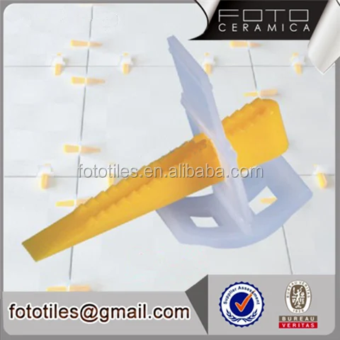 Foto ceramic porcelain tile leveling spacer wedge tile leveling system