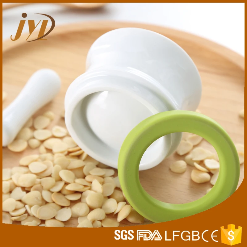 
China factory new design mini size herb spice small ceramic mortar and pestle with Silicone anti-skid ring 
