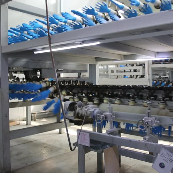 
China newest high quality cheap medical latex rubber glove machine production line with stripping machine 