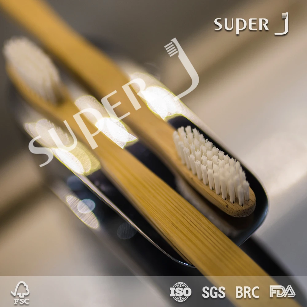 China Manufacturer Biodegradable feature charcoal bamboo toothbrush in yangzhou