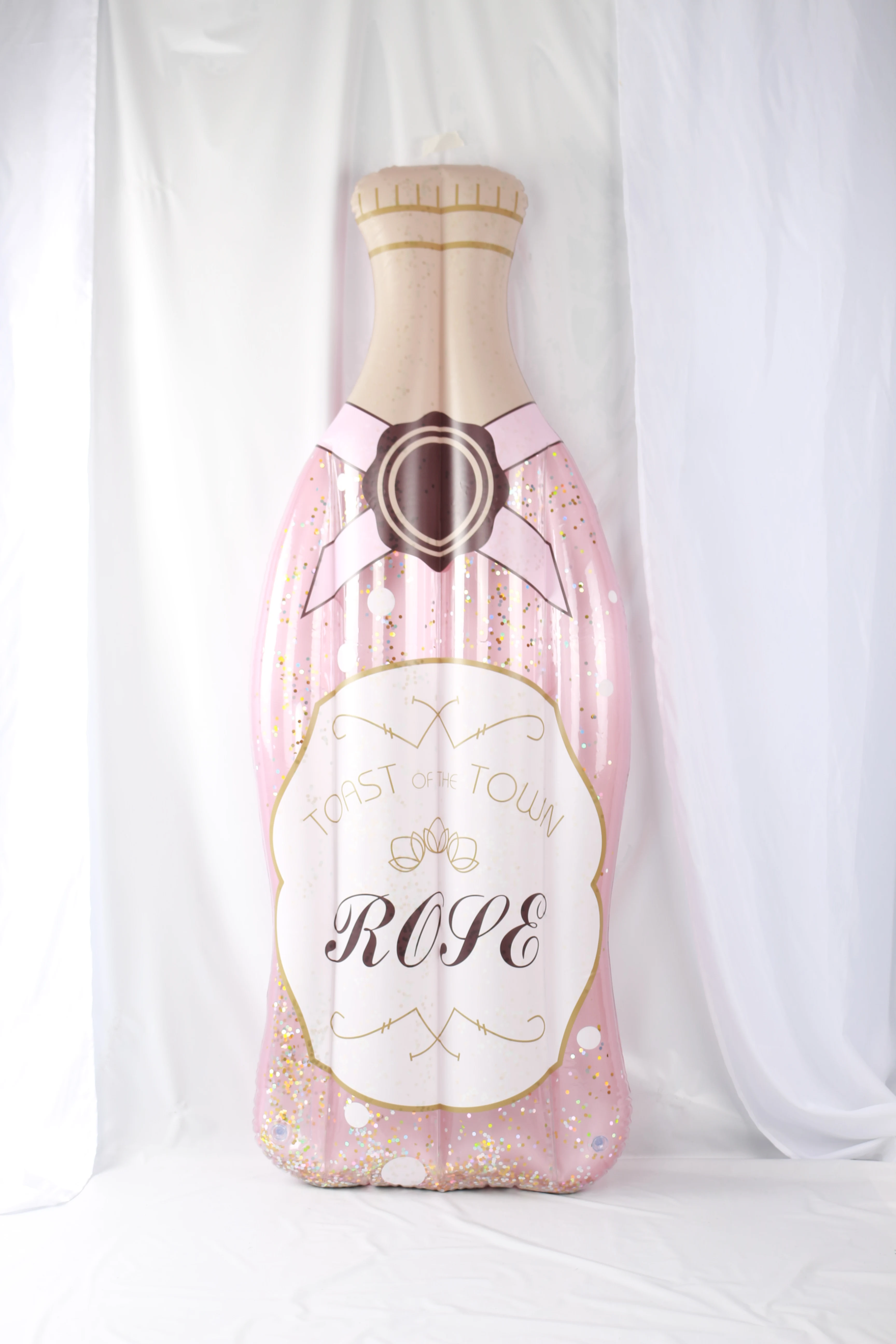 China factory custom pvc inflatable toy rose bottle pool float with glitter inside for adults