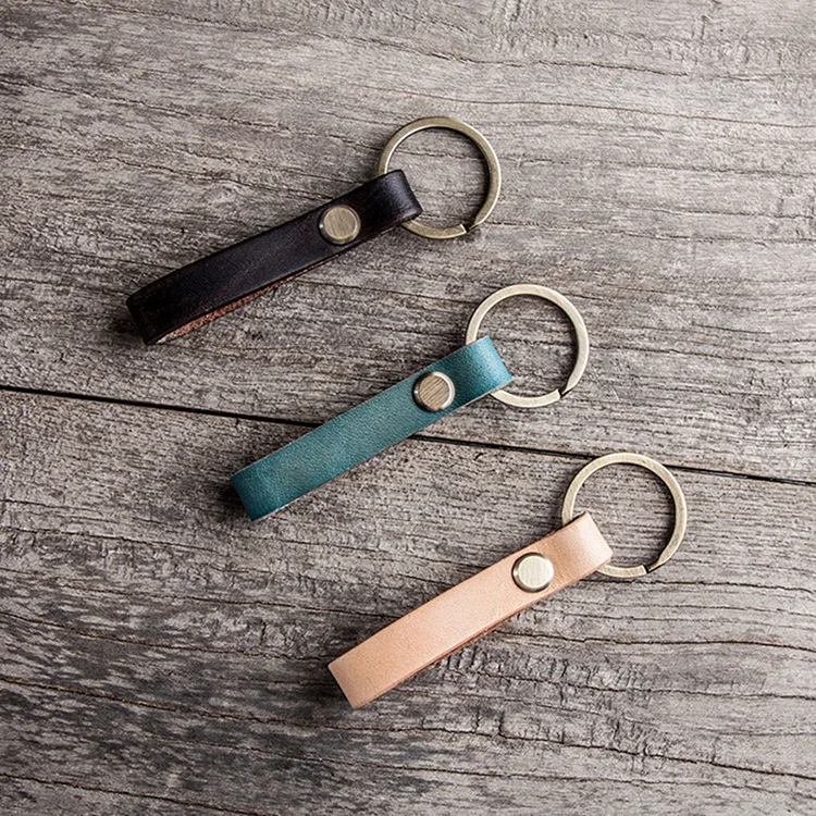 Кожаный брелок с логотипом под заказ оптовая продажа кожаных брелоков