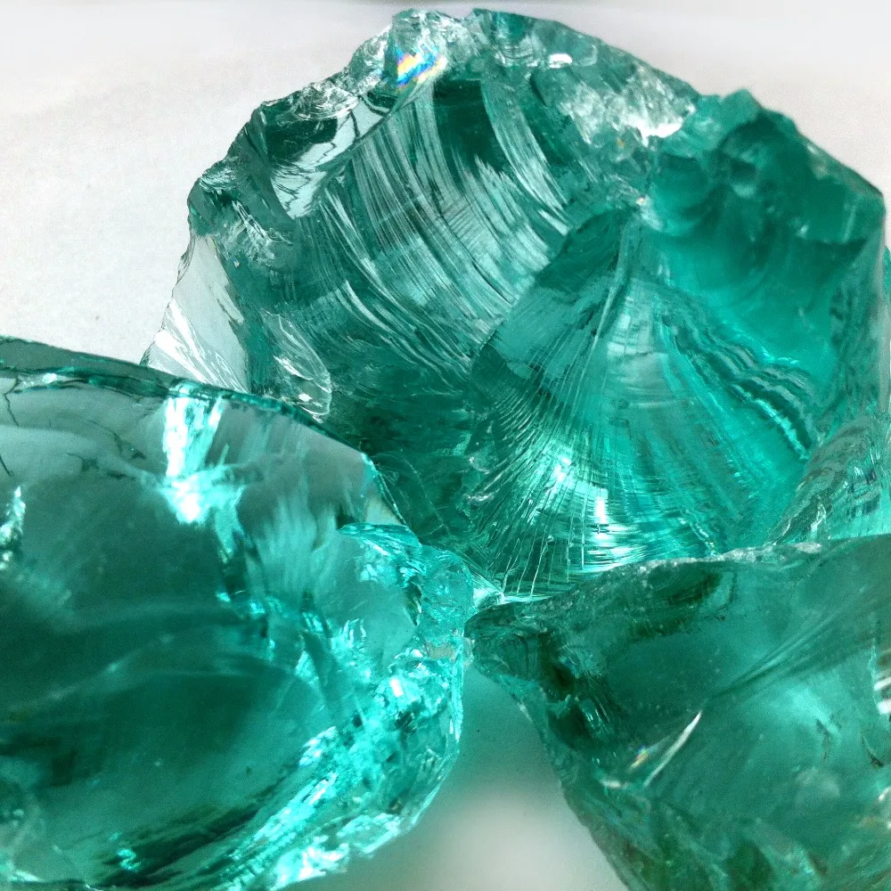 Natural turquoise green colored fire pit glass rocks