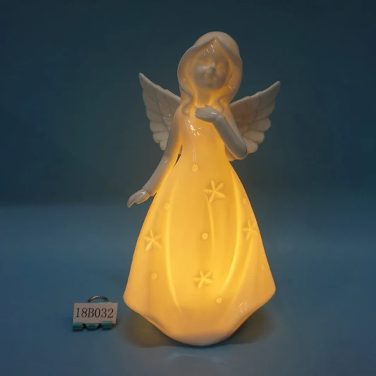 White porcelain angle figurine with light