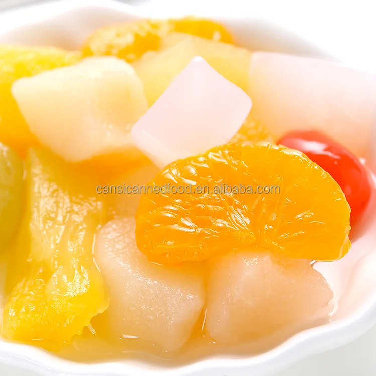 Тропические консервированные смешанные фрукты коктейли в легком сиропе