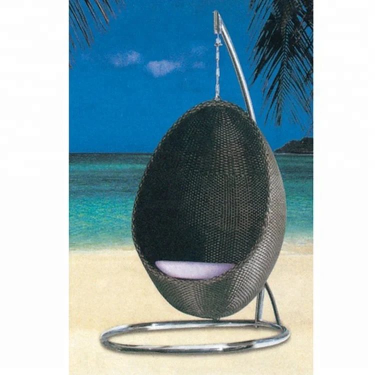 
Double sitting in outdoor wicker swing chair standing in beach hammock popular hammock 