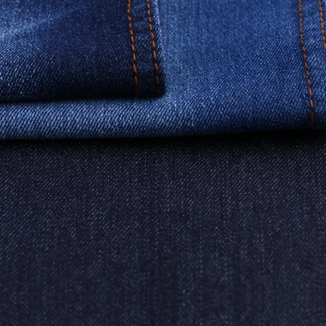 Синяя потертая эластичная джинсовая ткань для джинсов