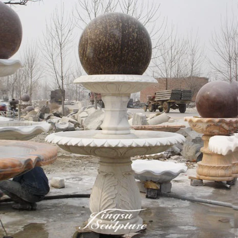 Hand carved granite spinning ball water fountain