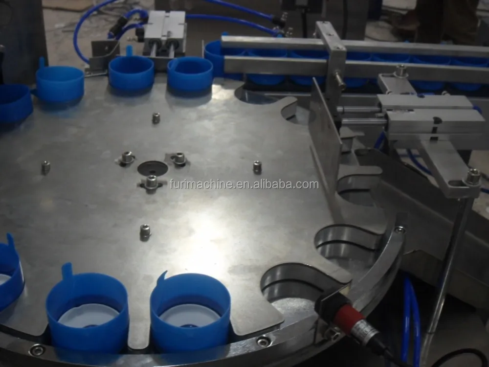 Non spill Cap foam Liner inserting machine