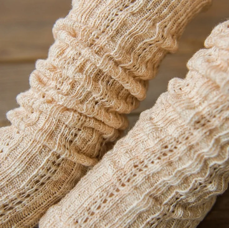 School girl knitting mid-calf lace leg warmer socks