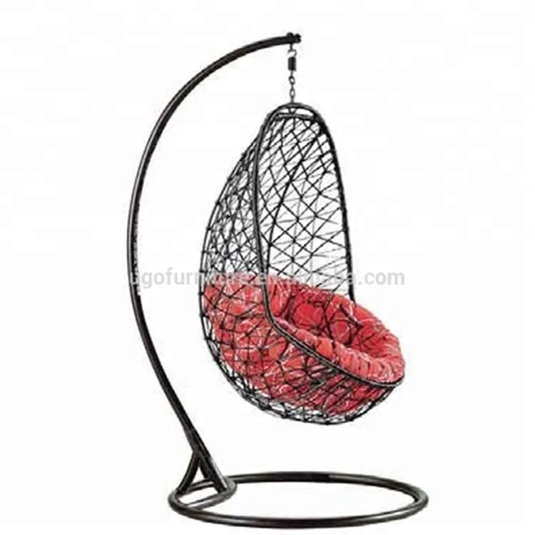 
Double sitting in outdoor wicker swing chair standing in beach hammock popular hammock 