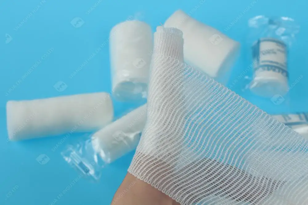 Conforming elastic cohesive stretch PBT bandage roll