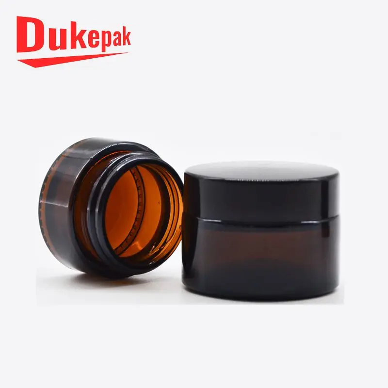 
Empty 30g 50g 100g amber glass cream jar with black plastic lid 