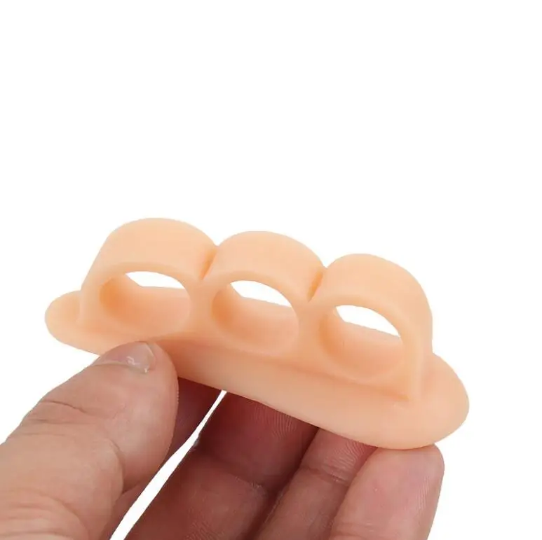 Hot Selling 3 Toe Holes  Silicone Gel Foot Care Hammer Toe Stretcher Separator for Hallux Valgus Correction